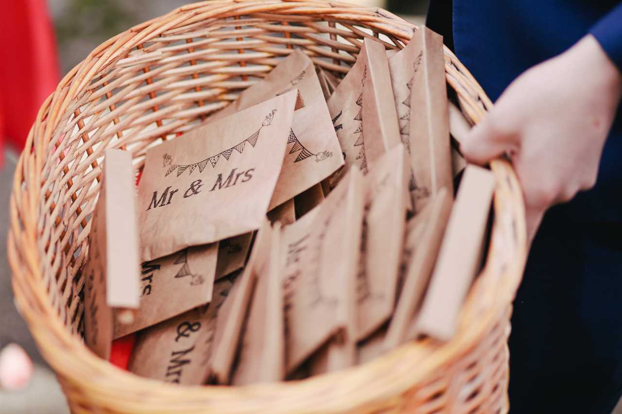 basket of wedding favors in brown paper