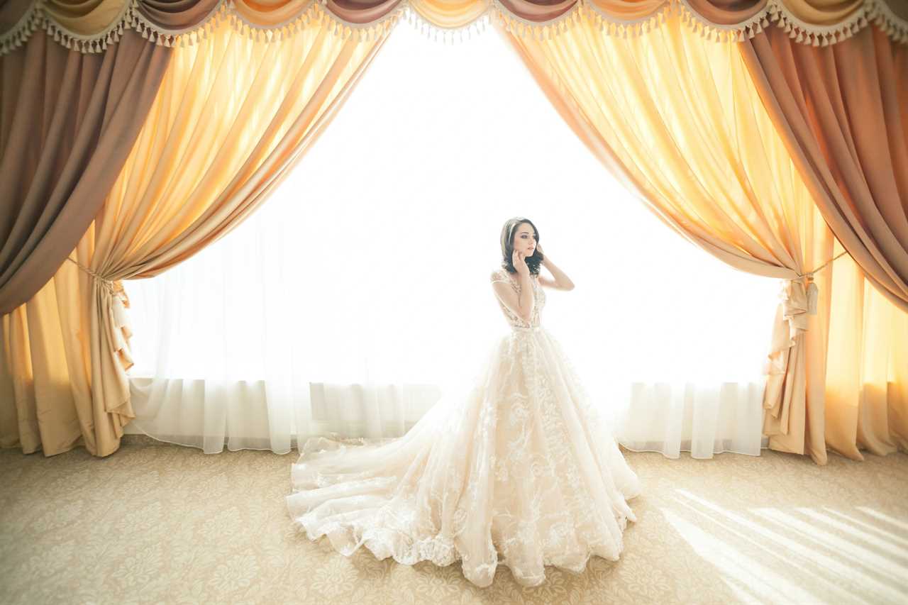 Bride in front of giant window